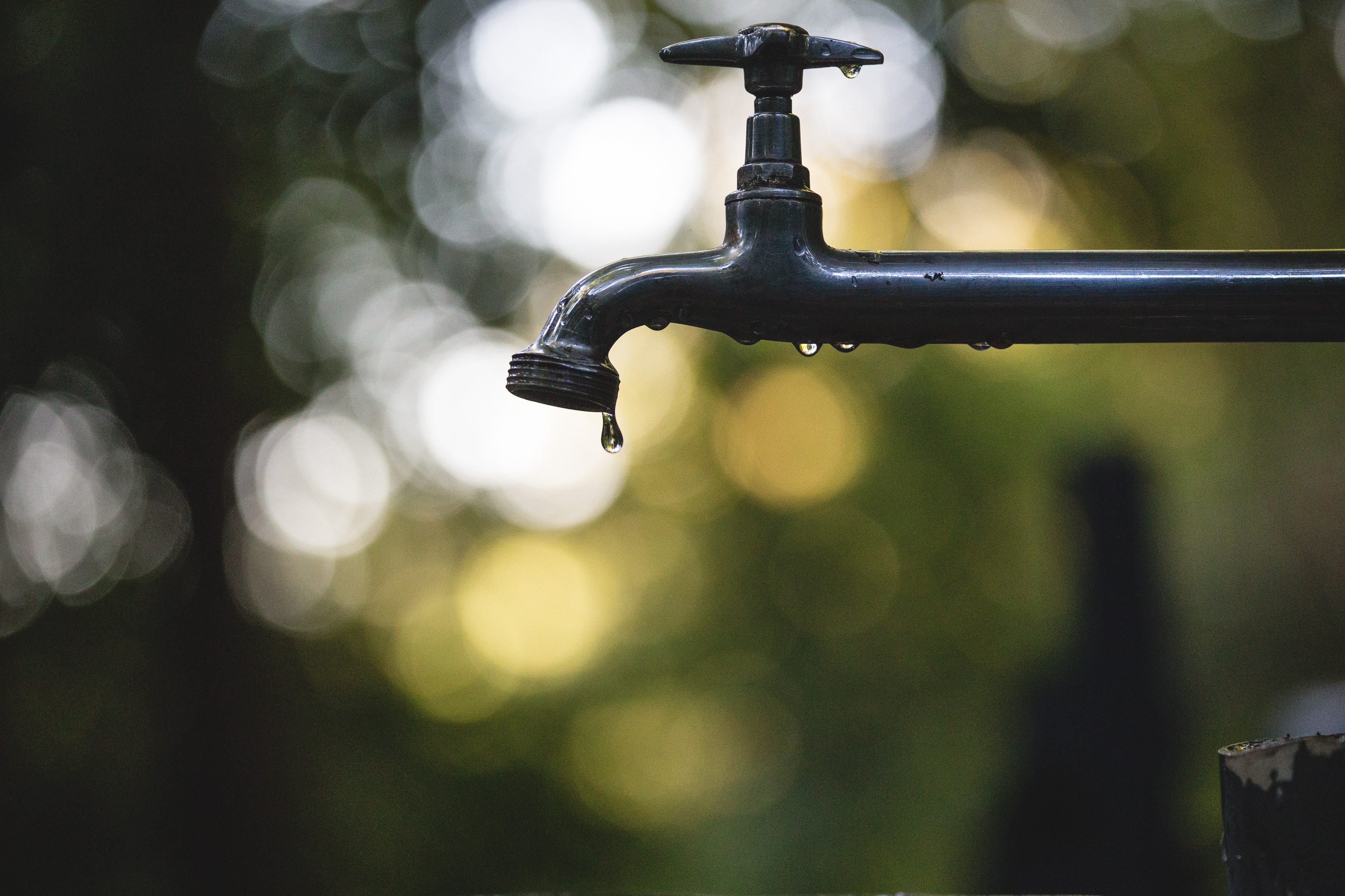 Water drips from an outdoor tap